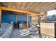 Outdoor patio area featuring a relaxing hot tub, a dining table, and beautiful pavers, perfect for enjoying the lake view at 428 Pinehaven Dr, New London, NC 28127