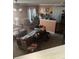 Spacious living room with neutral walls features plush furnishings, a ceiling fan, and great natural light at 4831 Belmar Place Rd, Charlotte, NC 28269
