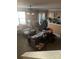 Spacious living room with neutral walls features plush furnishings, a ceiling fan, and great natural light at 4831 Belmar Place Rd, Charlotte, NC 28269