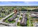 Aerial view of well-maintained townhomes with green lawns and mature landscaping at 489 26Th Ne Ave # C, Hickory, NC 28601
