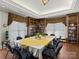 Spacious conference room with a large table, chairs, and built-in bookshelves, perfect for meetings at 489 26Th Ne Ave # C, Hickory, NC 28601