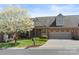 Charming brick home featuring a two-car garage and a lovely flowering tree at 489 26Th Ne Ave # C, Hickory, NC 28601