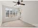 Sun room with large windows and glass door allowing ample natural light at 489 26Th Ne Ave # C, Hickory, NC 28601