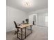 Bright home office with modern desk and neutral colors; ideal for a productive workspace at 5109 Arbordale Way, Mount Holly, NC 28120