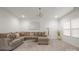 A living room featuring a comfortable sofa, modern decor, and neutral colors at 5109 Arbordale Way, Mount Holly, NC 28120