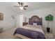 Charming main bedroom with a decorative headboard, ceiling fan, and comfortable bed set at 5109 Arbordale Way, Mount Holly, NC 28120