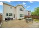 Backyard patio with outdoor seating and fenced yard, perfect for entertaining at 5109 Arbordale Way, Mount Holly, NC 28120