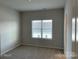 Well-lit bedroom features plush carpeting and a large window at 534 Dorman St, Belmont, NC 28012