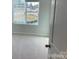 Bright bedroom featuring a large window offering natural light and neutral carpeting at 534 Dorman St, Belmont, NC 28012