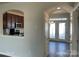 Kitchen with stainless steel microwave, oven, brown cabinets and white countertops at 534 Dorman St, Belmont, NC 28012