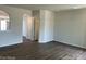 Living room showcases plank flooring, neutral paint, and arched openings at 534 Dorman St, Belmont, NC 28012