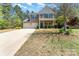 Charming two-story home with a two-car garage, lovely landscaping, and a welcoming front porch at 6010 Hawk View Rd, Waxhaw, NC 28173
