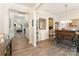 Open-concept hallway leading to the dining area and living room with natural lighting at 6010 Hawk View Rd, Waxhaw, NC 28173