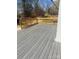 Large wooden deck with railings, perfect for entertaining or enjoying the outdoors at 6372 Morehead St, Harrisburg, NC 28075