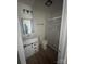 This bathroom features a shower with sliding glass doors and a vanity with a mirror at 6372 Morehead St, Harrisburg, NC 28075
