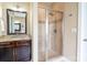 Bathroom featuring a walk-in shower with glass door and granite countertop at 641 Weyburn Nw Dr, Concord, NC 28027