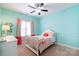 Charming bedroom with bright turquoise walls and coordinated decor at 641 Weyburn Nw Dr, Concord, NC 28027