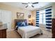 Inviting bedroom with plush carpet, nautical theme, and ample natural light at 641 Weyburn Nw Dr, Concord, NC 28027