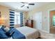 Cozy bedroom featuring wood accents, nautical theme, and ample natural light at 641 Weyburn Nw Dr, Concord, NC 28027