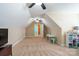 Large bonus room with an open floor plan features built-in storage, a table and chairs at 641 Weyburn Nw Dr, Concord, NC 28027