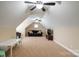 Expansive bonus room provides versatility and features multiple ceiling fans and natural light at 641 Weyburn Nw Dr, Concord, NC 28027