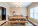 Inviting dining room with a wooden table, bench seating, and stylish decor for comfortable dining at 641 Weyburn Nw Dr, Concord, NC 28027