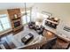 Open-concept living area with a stone fireplace and kitchen view from above at 641 Weyburn Nw Dr, Concord, NC 28027