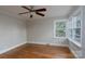 Cozy bedroom with natural light and classic hardwood floors at 676 Forest Nw St, Concord, NC 28025