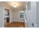 Bright dining room with hardwood floors and adjacent updated kitchen at 676 Forest Nw St, Concord, NC 28025