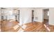 Open living area leading to the updated kitchen at 678 Wagner St, Troutman, NC 28166