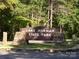 Welcoming sign for Lake Norman State Park, framed by natural stone accents and lush greenery at 678 Wagner St, Troutman, NC 28166