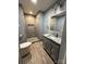 Updated bathroom featuring modern fixtures and a tiled walk-in shower at 705 3Rd Nw Ave, Hickory, NC 28601