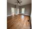 Bedroom features hardwood floors, a ceiling fan, and great natural light at 705 3Rd Nw Ave, Hickory, NC 28601