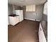 The spacious laundry room is complete with storage cabinets and sink at 705 3Rd Nw Ave, Hickory, NC 28601
