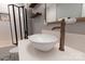 Updated bathroom boasting patterned tile flooring, stylish vanity, bronze fixtures and subway tile shower at 718 W Trade St # 808, Charlotte, NC 28202