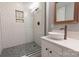 Modern bathroom featuring a spacious shower with white subway tile and a stylish vessel sink at 718 W Trade St # 808, Charlotte, NC 28202
