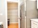 This kitchen offers a walk-in pantry with ample shelving space for food and storage at 718 W Trade St # 808, Charlotte, NC 28202