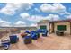 Stunning rooftop deck with a fire pit, stylish furniture and a pergola dining area at 718 W Trade St # 808, Charlotte, NC 28202