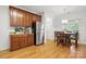 Spacious kitchen area with stainless steel refrigerator and adjacent breakfast nook at 7268 Kiskadee Dr, Denver, NC 28037