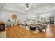 Spacious living room with hardwood floors, neutral decor, and ample natural light at 7268 Kiskadee Dr, Denver, NC 28037