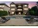 Stunning backyard with a large pool, lounge chairs, and multi-level decks, perfect for outdoor entertaining at 7944 Park Rd, Charlotte, NC 28210