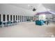 Spacious bonus room with a variety of seating, desks, and lots of storage at 7944 Park Rd, Charlotte, NC 28210