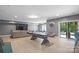 Recreation room with a pool table, sectional sofa, and access to the backyard at 7944 Park Rd, Charlotte, NC 28210