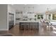 Spacious kitchen features a large island, stainless steel appliances, and hardwood floors at 7944 Park Rd, Charlotte, NC 28210