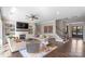 Cozy living room with a fireplace, built-in shelves, and comfortable seating, creating a warm and inviting atmosphere for gatherings at 7944 Park Rd, Charlotte, NC 28210