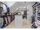 A large walk-in closet with custom shelving and storage for organization at 7944 Park Rd, Charlotte, NC 28210