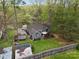 Aerial view of a home featuring a trampoline, shed, and spacious, well-maintained backyard at 813 Deer Path Pl, Mooresville, NC 28115