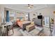 Comfortable bedroom with a writing desk and a gray bed and furnishings at 813 Deer Path Pl, Mooresville, NC 28115