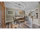 Cozy dining area featuring a wooden table, bench, and rustic light fixture at 813 Deer Path Pl, Mooresville, NC 28115