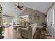 Comfortable living room showcasing hardwood floors, and access to outdoor living space at 813 Deer Path Pl, Mooresville, NC 28115